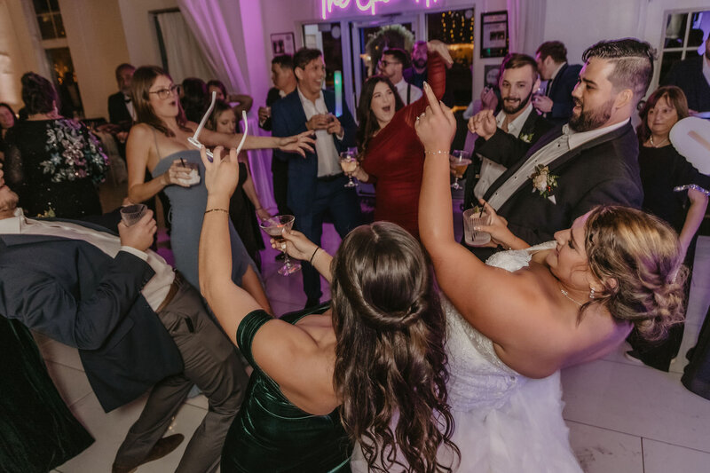 bride and guests on the dance floor