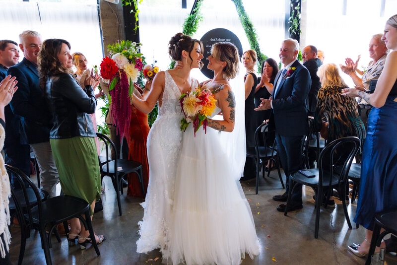 LGBTQ couple getting married in a colorful wedding Oregon Coast Elopement and Wedding Photographer