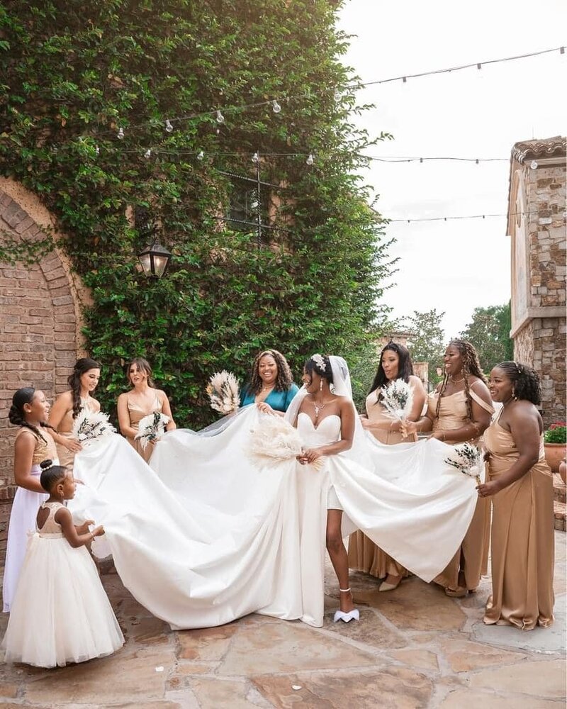 groom dips bride romantically inside Disney wedding chapel