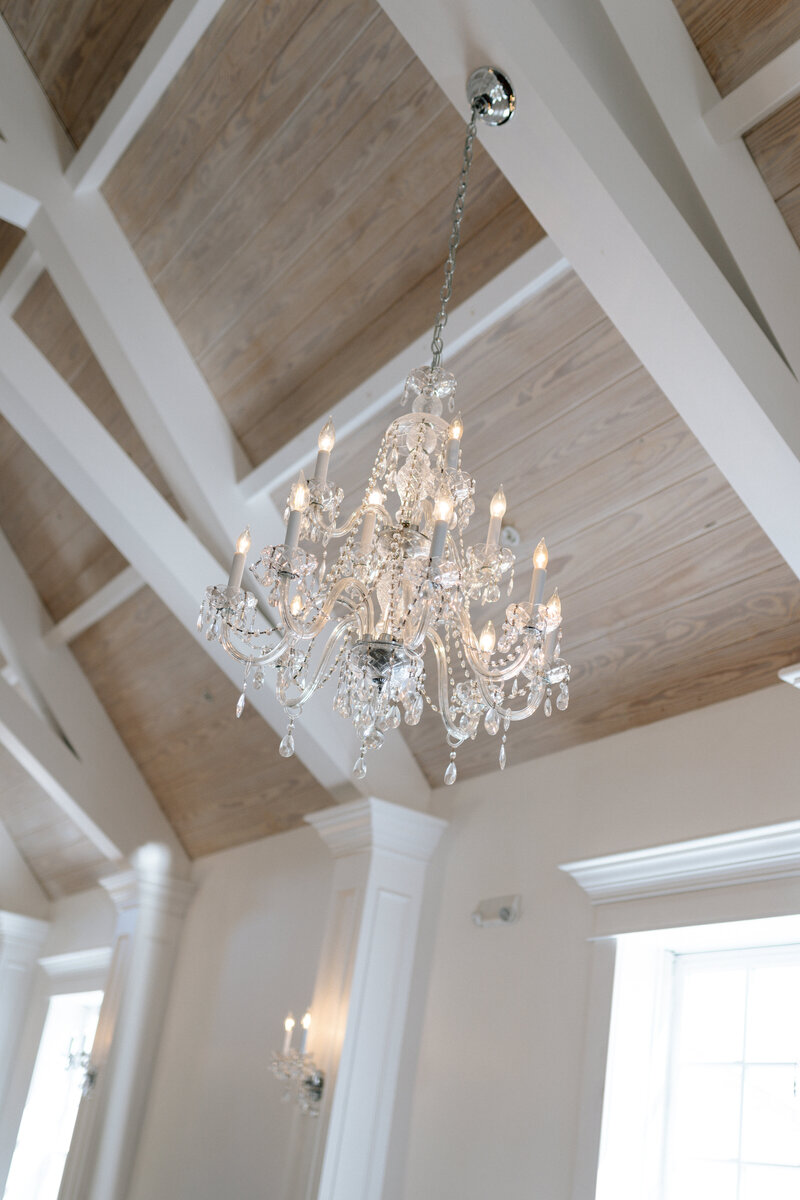 Chandelier hanging above ceremony at The White Room in St. Augustine 