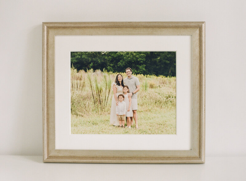 Gold framed portrait of a family photo as offered by Raleigh family photographers A.J. Dunlap Photography.