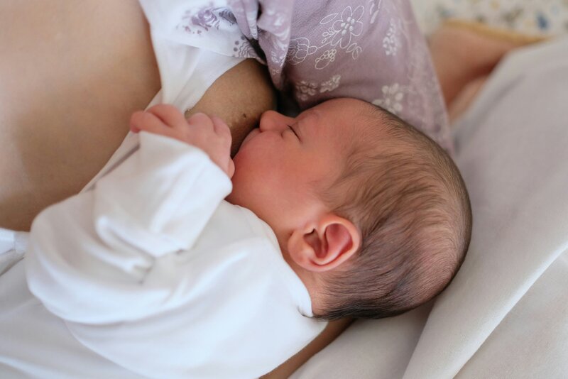A baby breast feeding