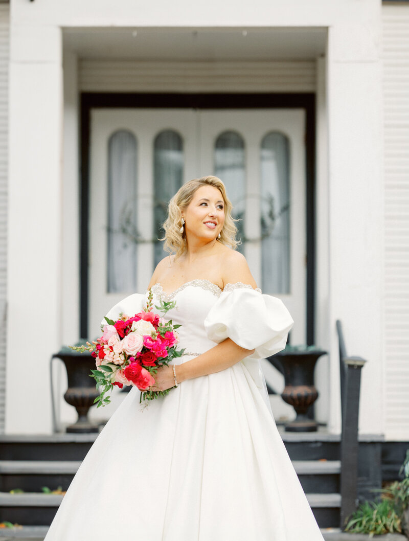 bride holding flowers