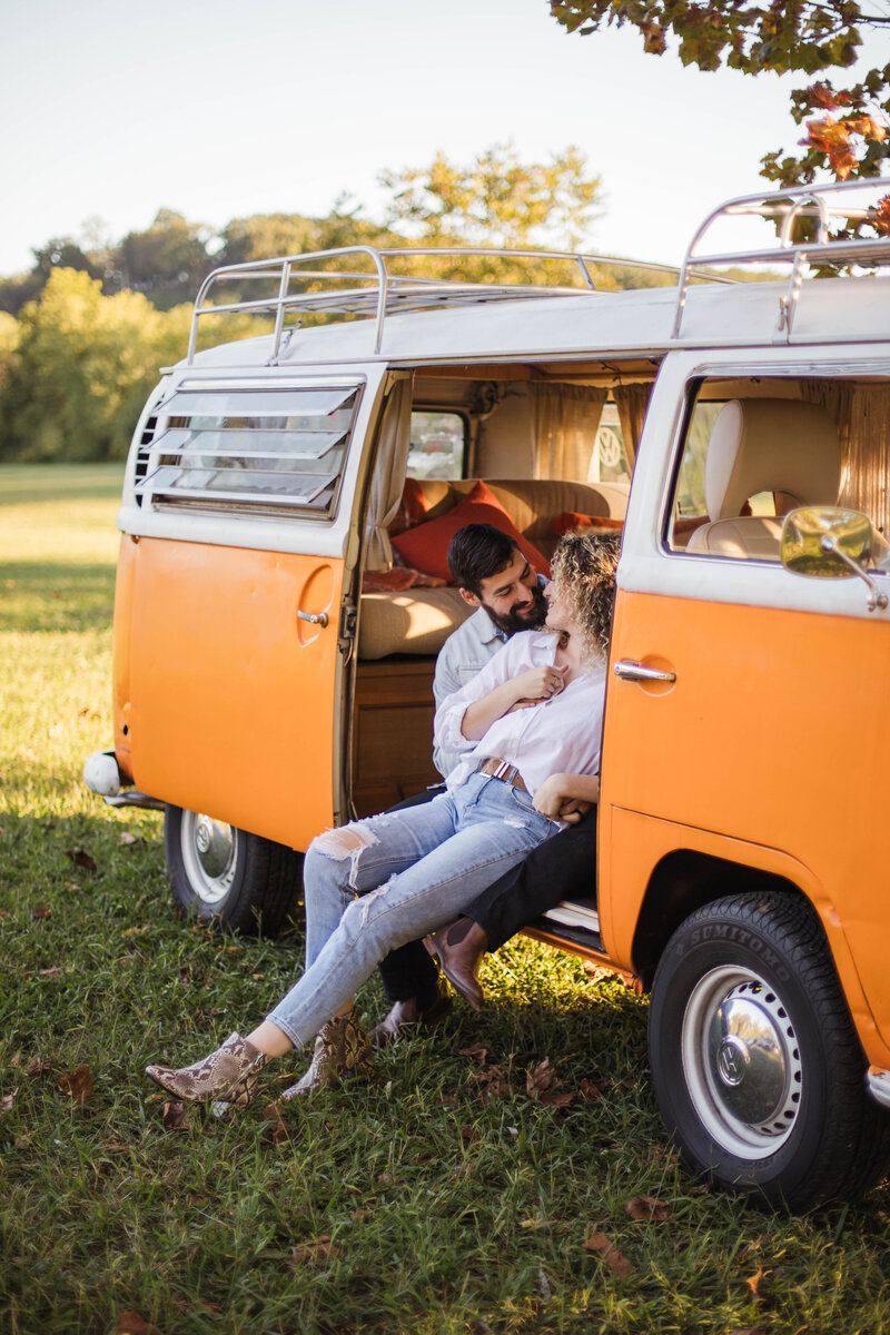 couple sitting in old van during nashville engagement photography