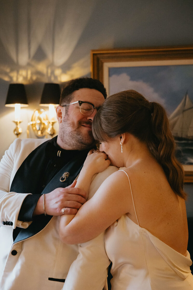 Bride and groom sharing an intimate embrace