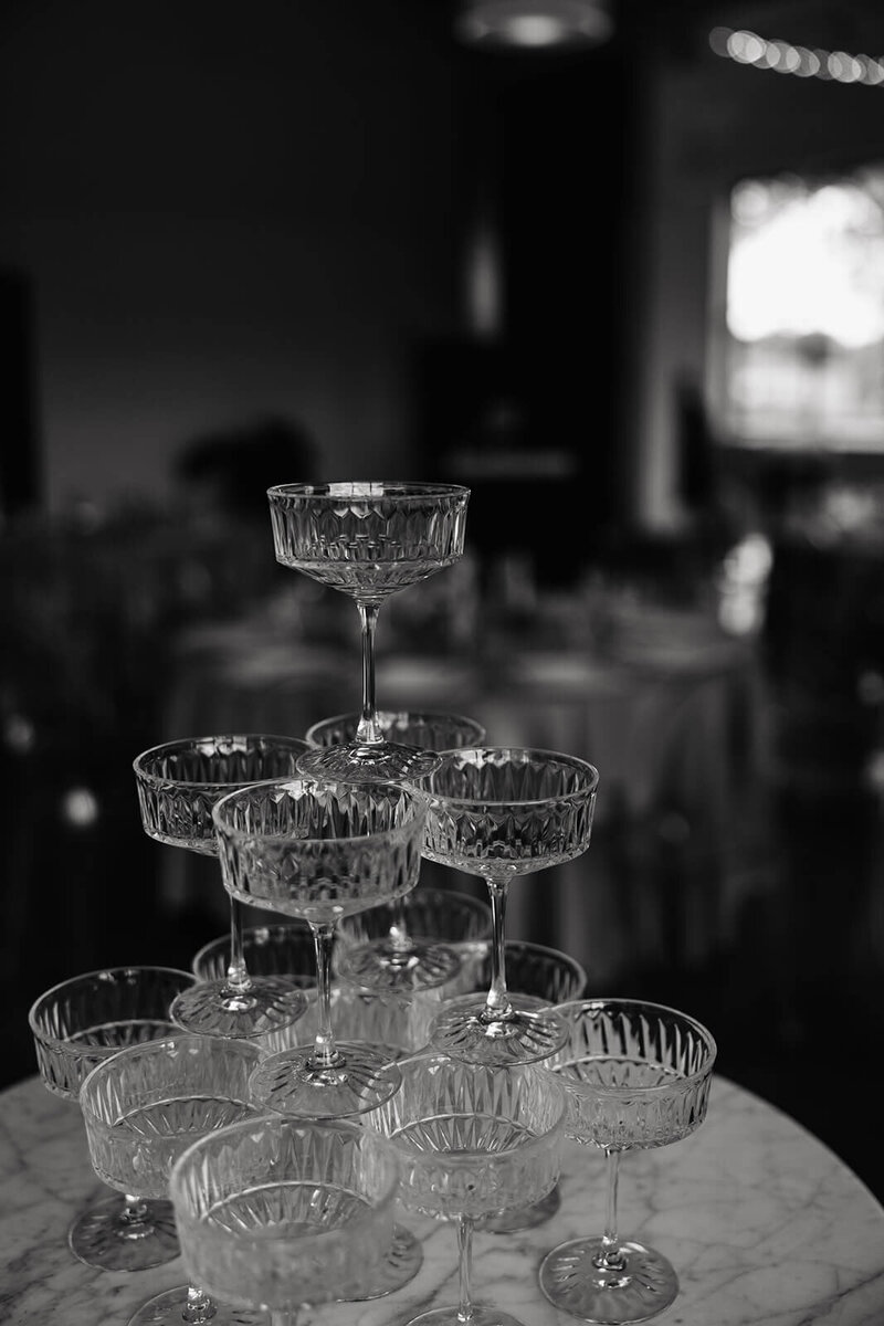 Champagne tower with coup glasses in luxury Minnesota wedding
