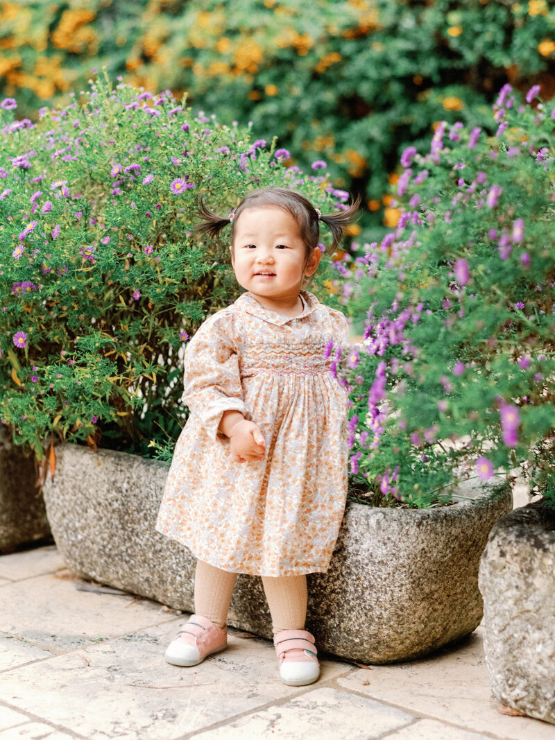 Portrait of a little girl in the gardens of the château