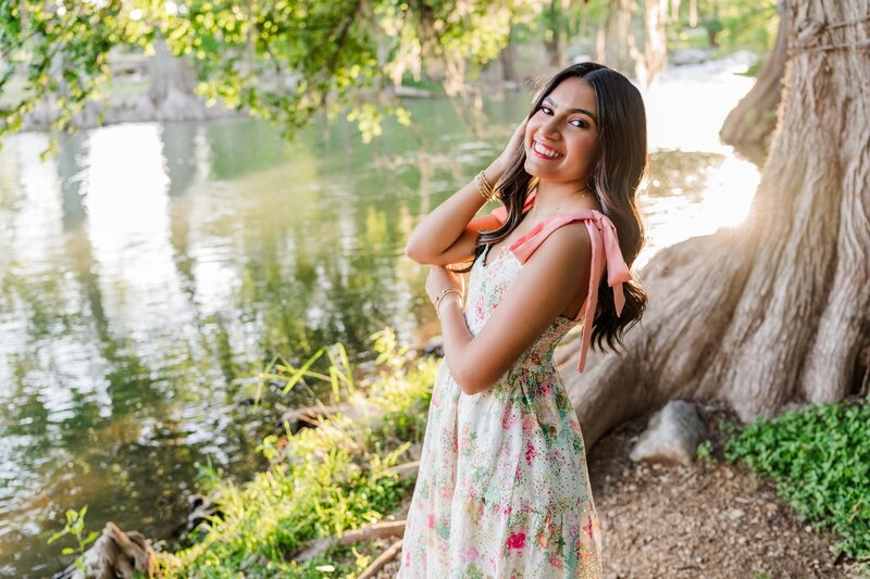 San Antonio senior photos by the water in Gruene 
