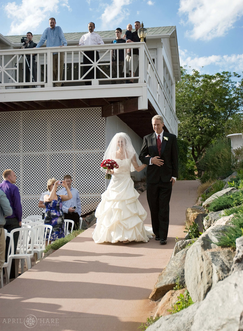 Willow-Ridge-Manor-Wedding-Ceremony-Outside-on-Sunny-Day-in-Colorado