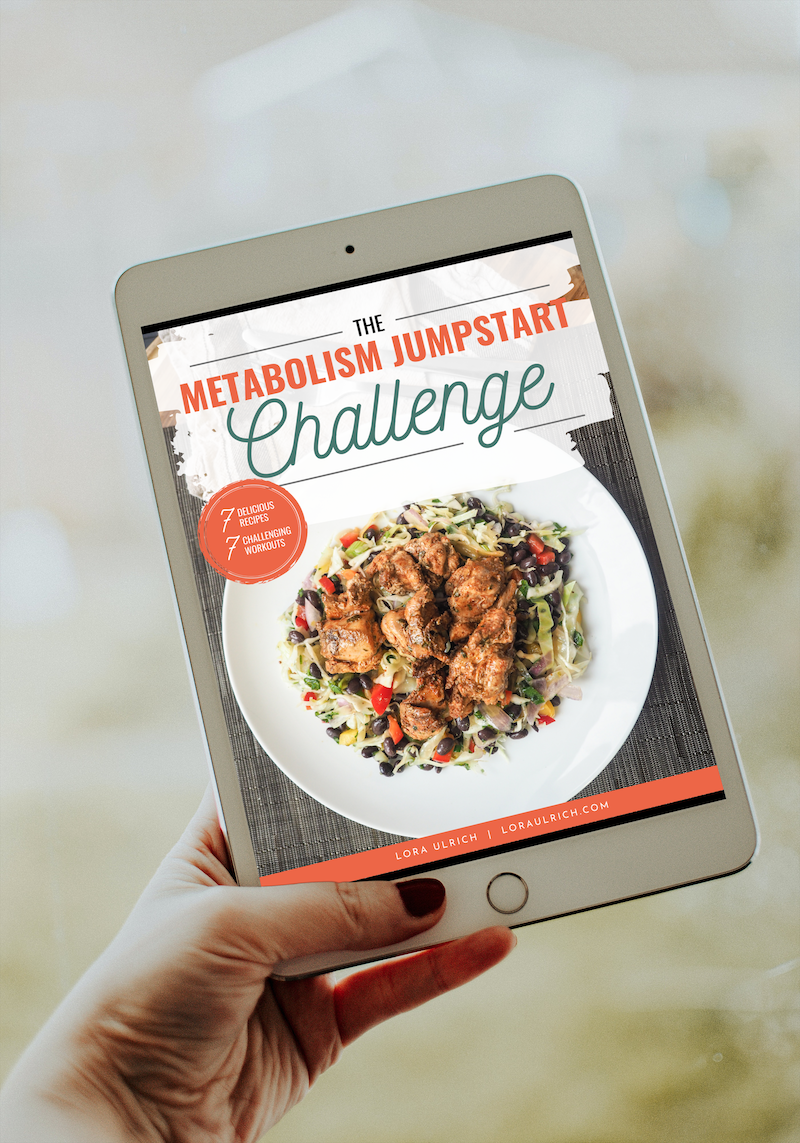 An iPad displaying 'The Metabolism Jumpstart Challenge' e-book cover with a healthy meal on the screen.
