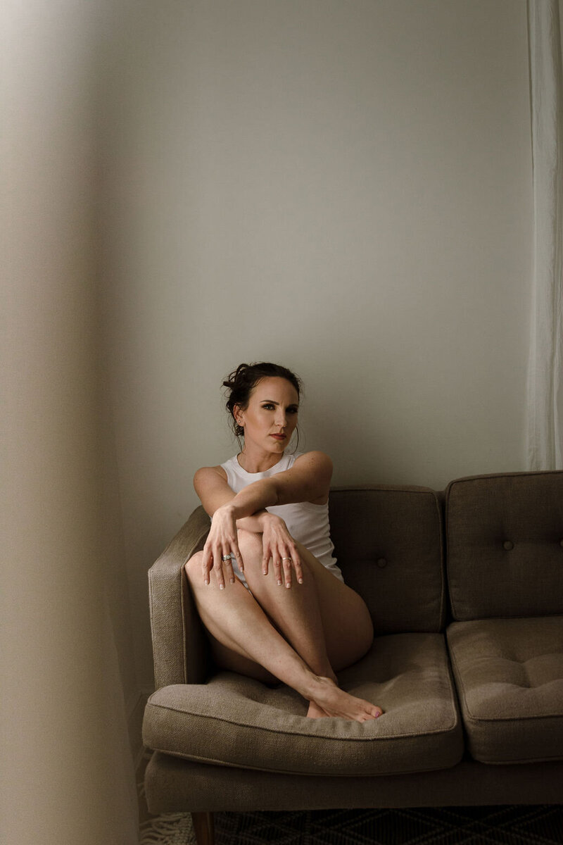 Sexy image of woman on sofa