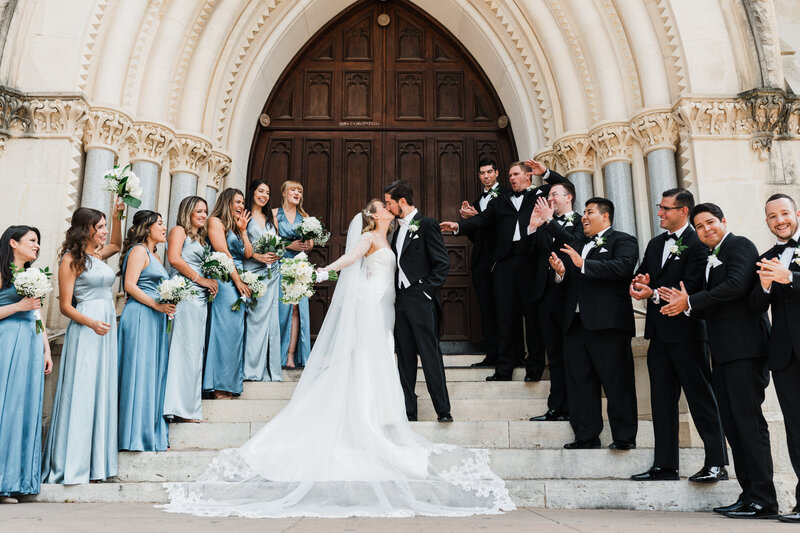 bride and groom with wedding party