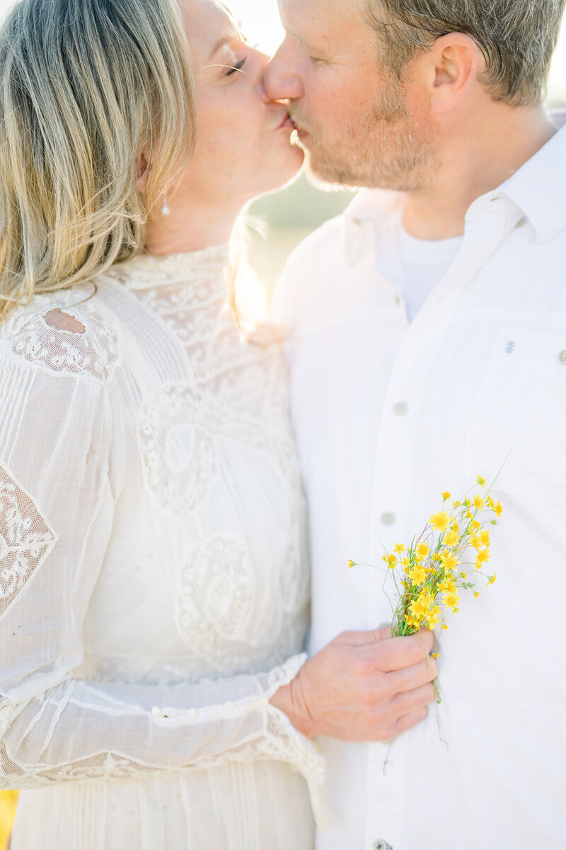 A couple enjoys a sunlit engagement session at the beautiful Villa Montalvo in Saratoga, California, captured by Tiffany Longeway Photography