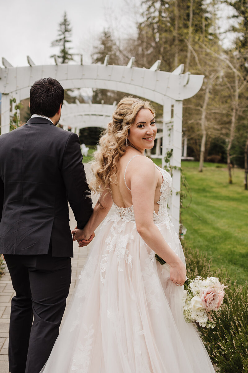 Bride looking in mirror