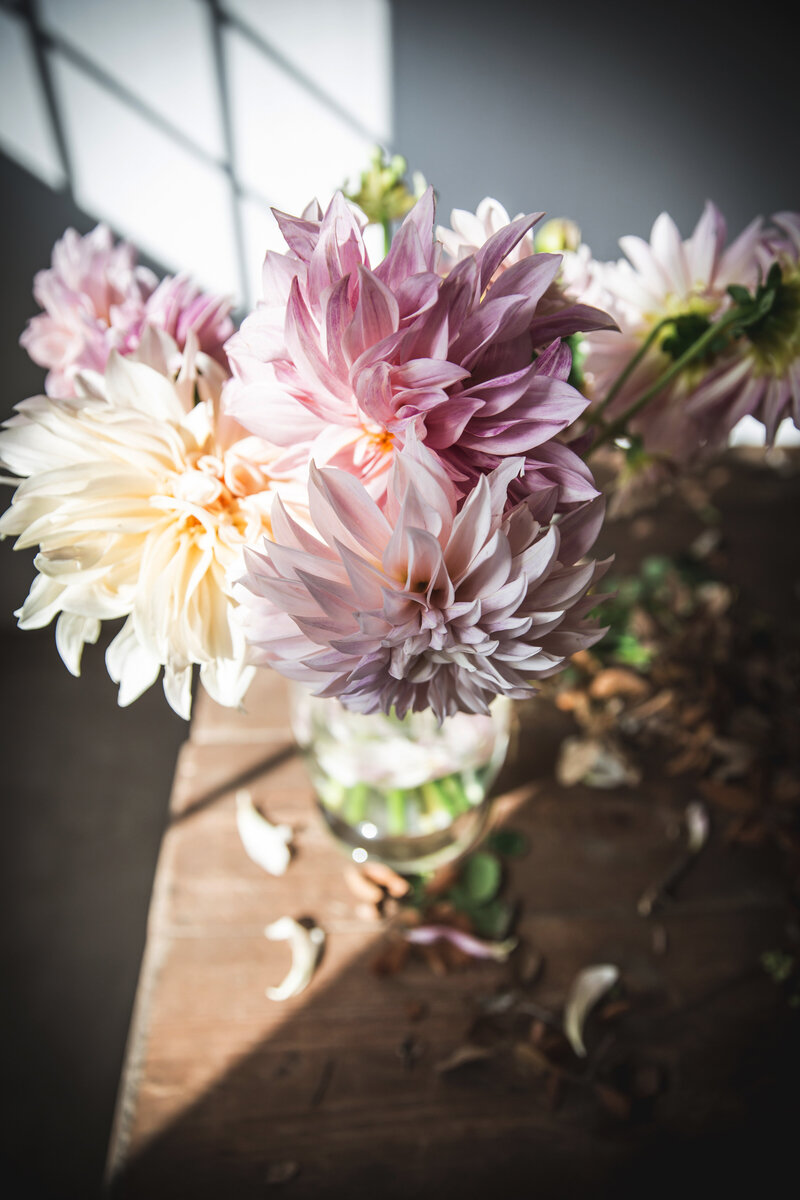 bunches-of-flowers-in-vases-on-table-2023-11-27-04-57-46-utc