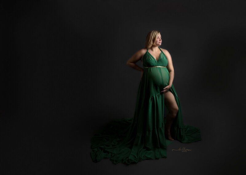 Pregnant Woman in a emerald green gown