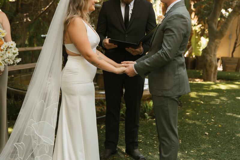 bride and groom hand in hand