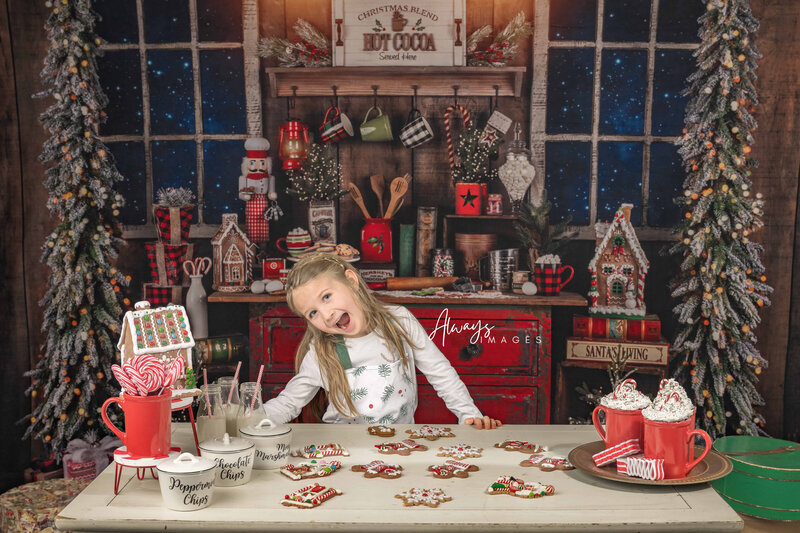 Santa's Kitchen with Little Girl Baking Cookies and laughing