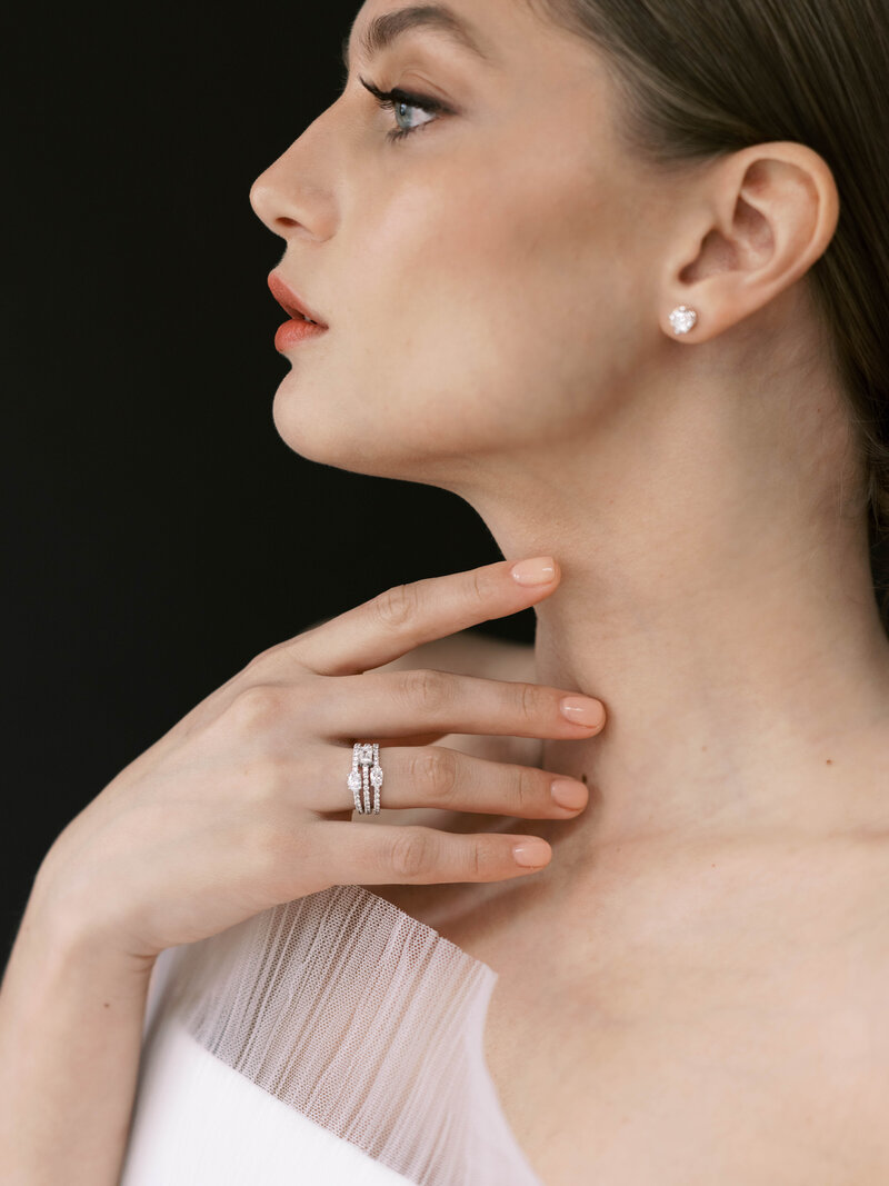 Commercial photography of model wearing diamond rings from Or & Ell Diamond