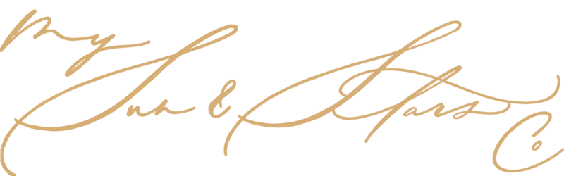 Flowing yellow gold cursive that says My Sun & Stars Co