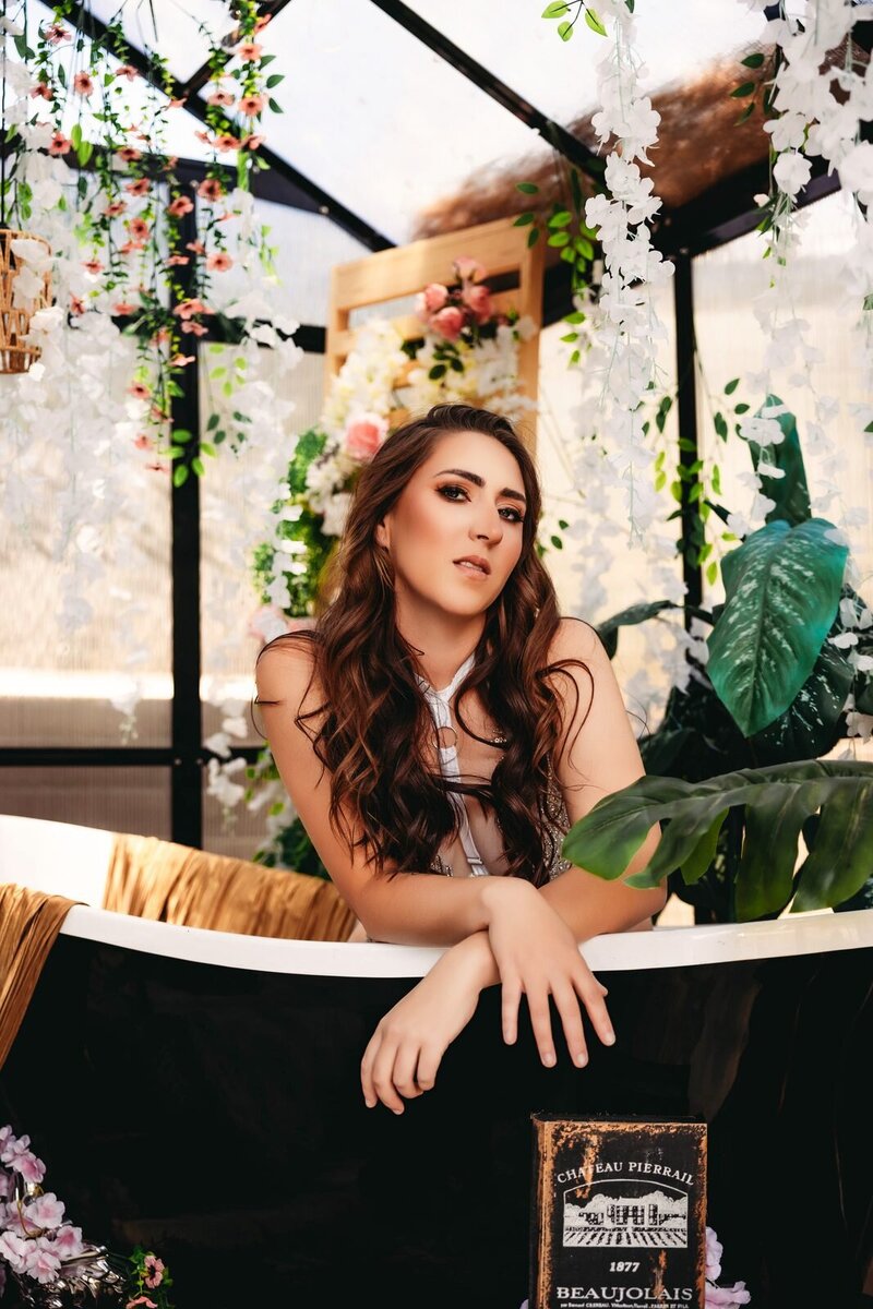 Floral bathtub boudoir photo by Ivory & Lace Studios in Kingman, Arizona