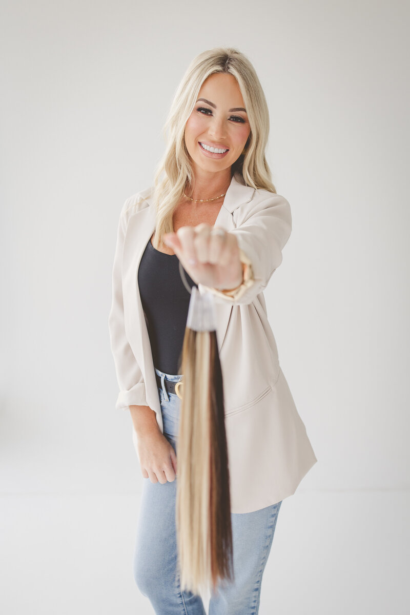 Hair extension specialist Casey Brian in West Monroe, LA