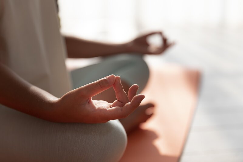 close-up-kid-meditating-mat