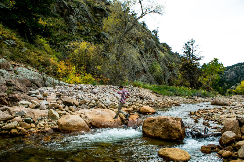 Longmont senior photo that was taken on a river on a fall day
