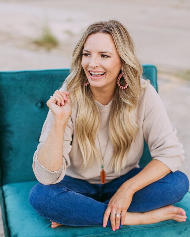 Photo of Christy Jo Lightfoot,  business coach specializing in scalable offers and passive income strategies.