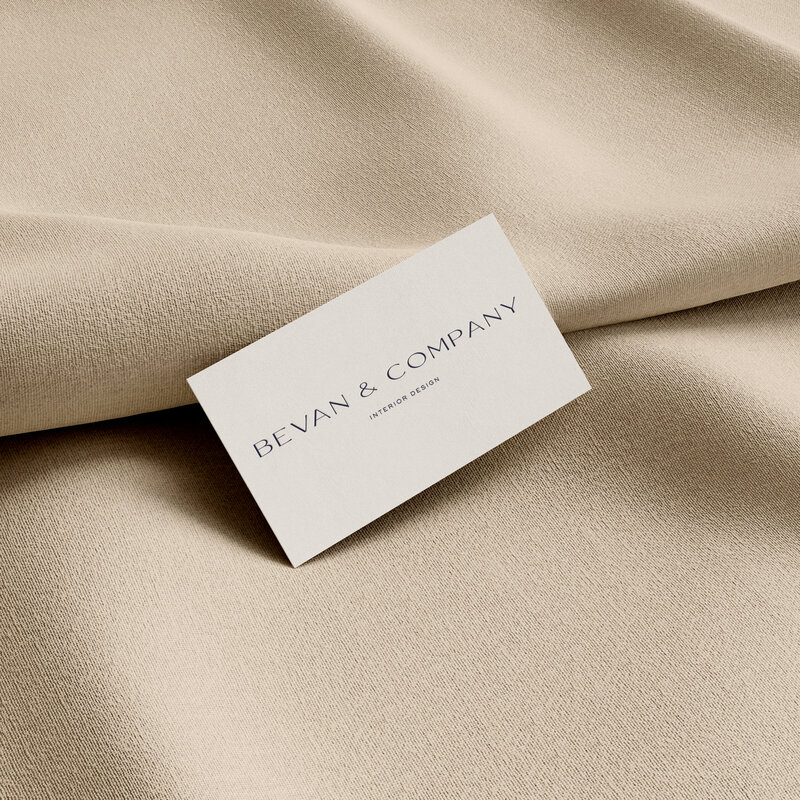 Bevan and Company Interior Design business card mockup on tan fabric
