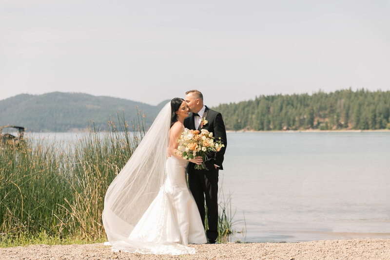 groom kissing bride