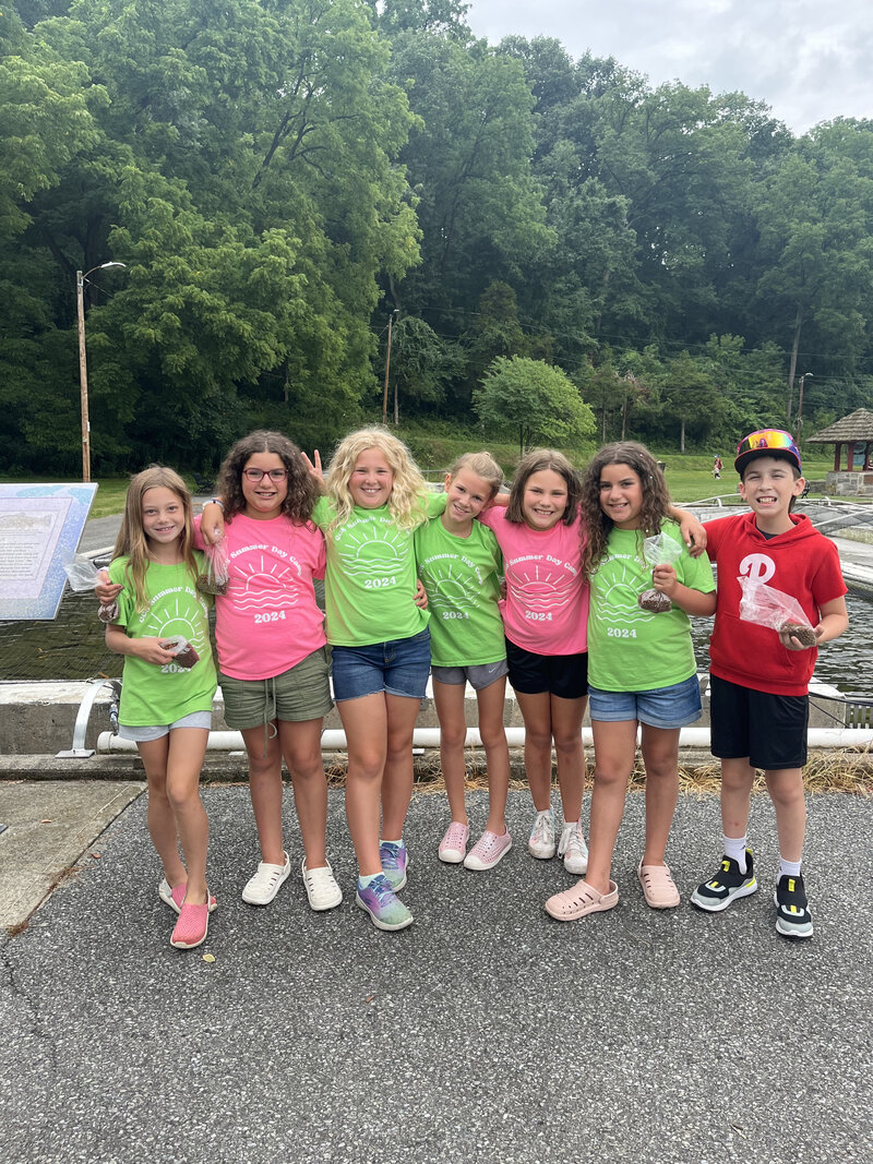 Smiling kids at summer day camp.