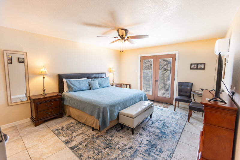 Bedroom in wimberley hotel suites