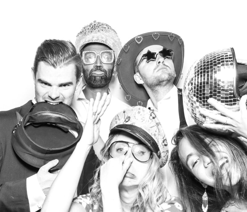 B&W image for a Premium photo booth hire and rental for outdoor  weddings, corporate events, brand activations with mad hat photo booth rental