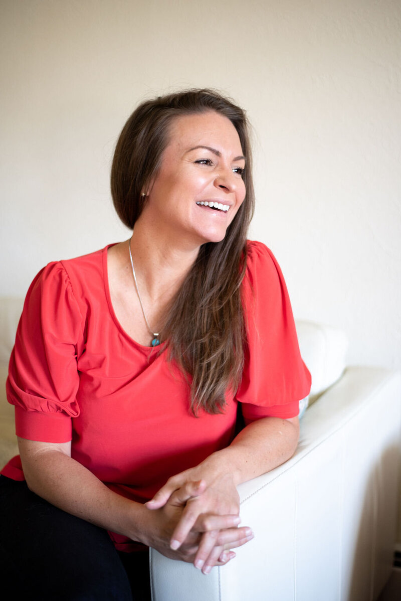 Sarah Schweppe reconnecting with inner wisdom through body-based coaching, representing soulful love, clarity, and personal transformation.