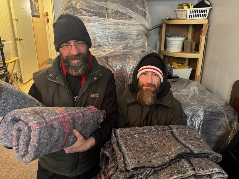 Community members receiving support and essentials through All Around Performance's outreach efforts