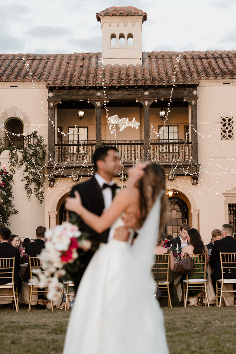 beautiful bride in front of the Howey mansion wedding venue