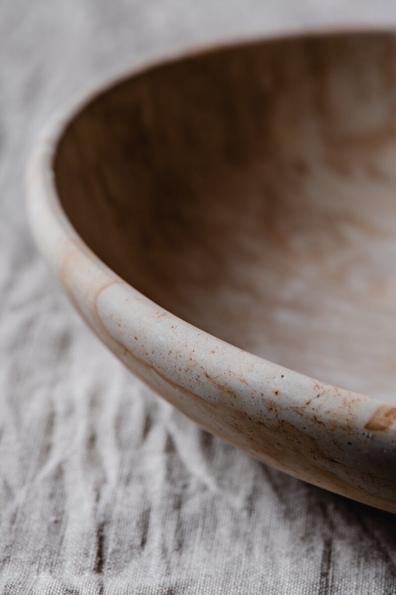 Rustic stoneware bowl used to hold smudging sage, salt crystals, cleansing and clearing energy before and after a reiki session