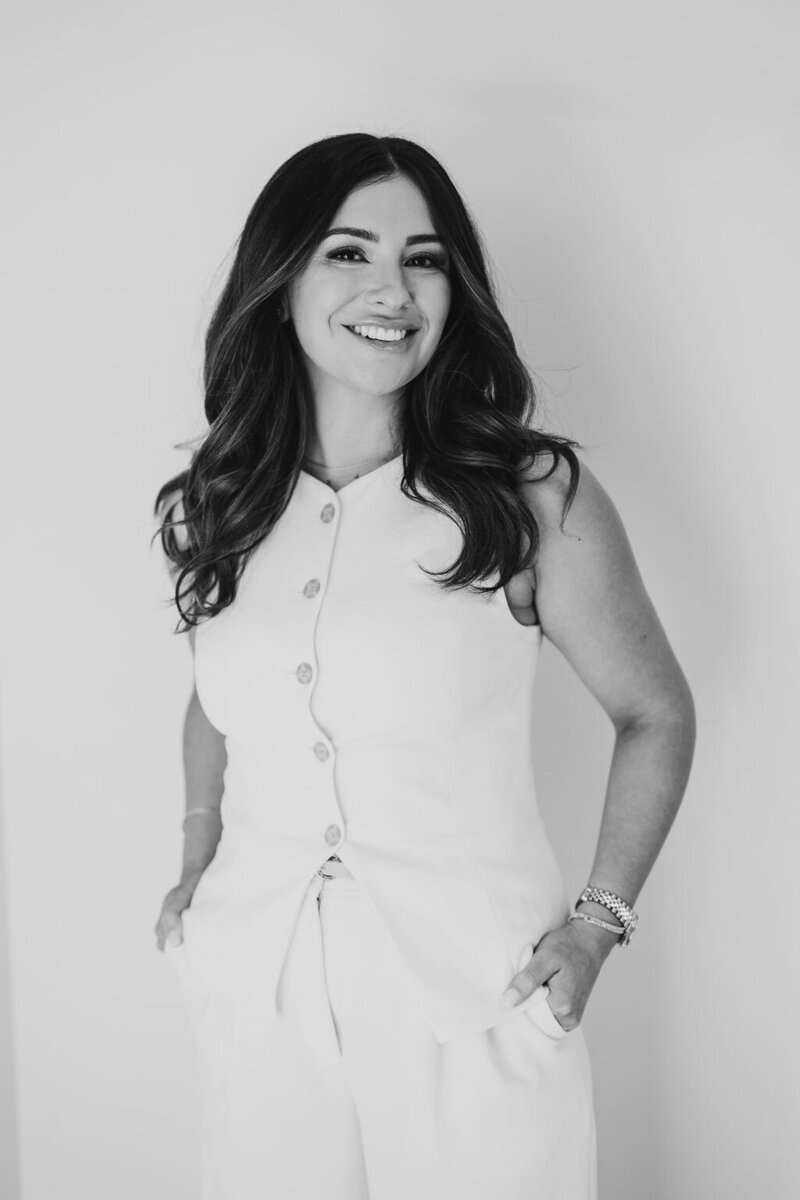 Melony Berg, Realtor at Capital Realty Group posing in a professional headshot.