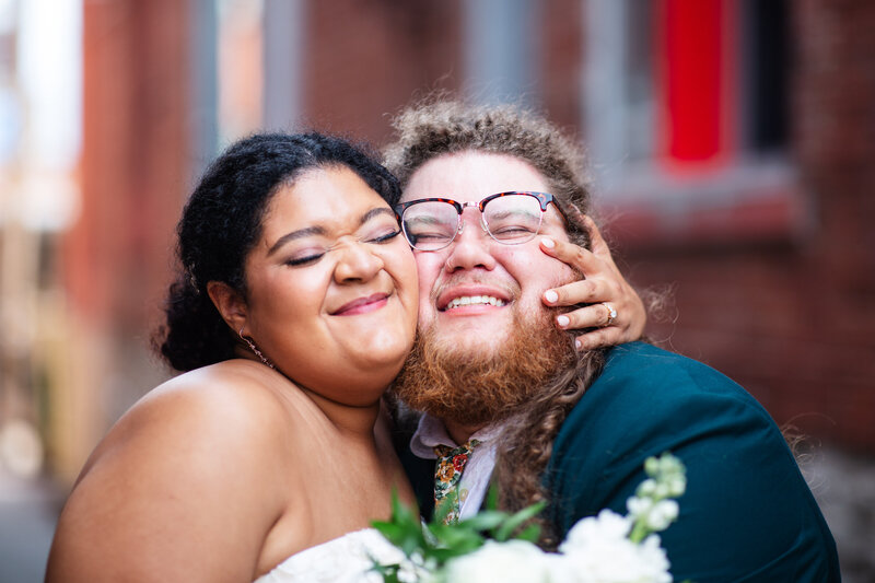 Kansas City Wedding Photographer, couple kissing after leaving ceremony