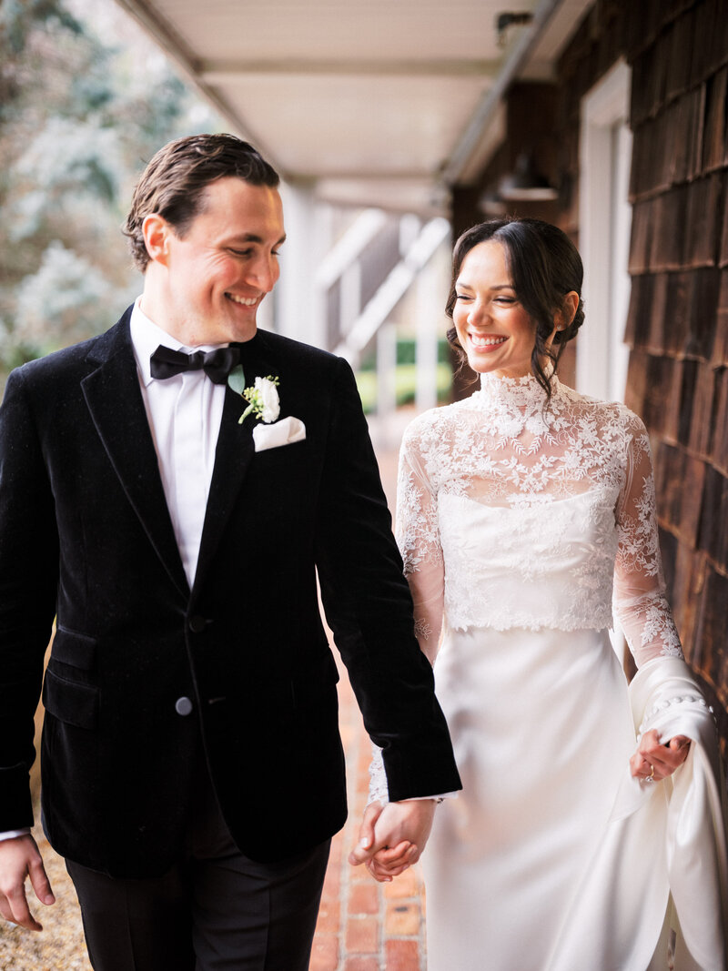 Bride and groom walk towards camera