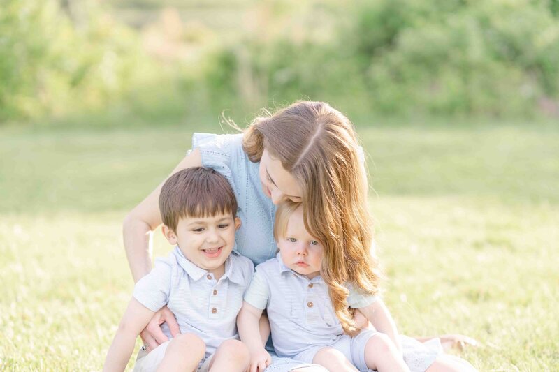 Mom tickling son during Haymarket, VA session