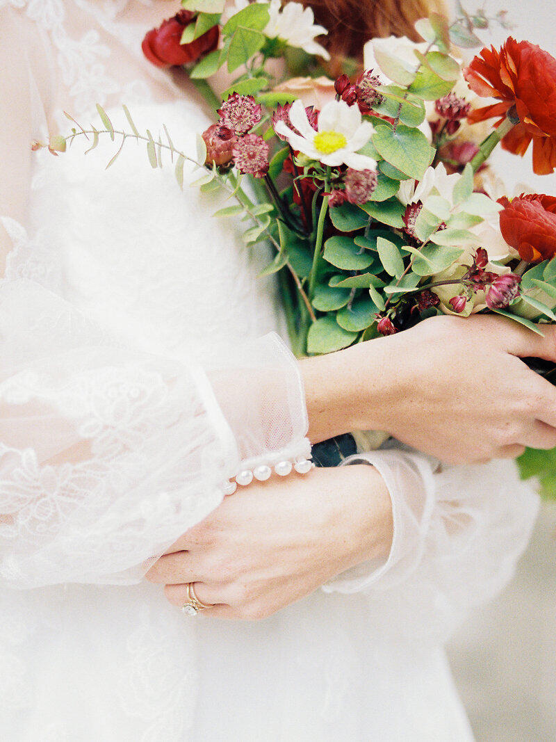 Bride holding florals