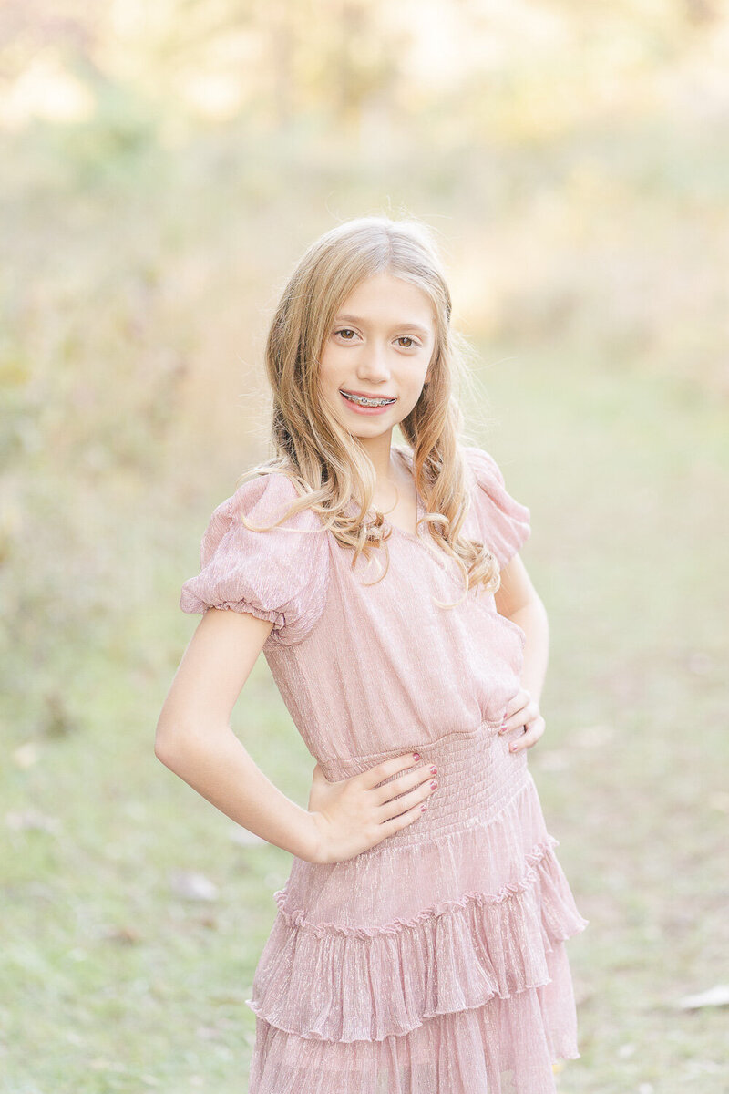 close up of girl with hands on waist taken during fall minis in Prince William County, VA