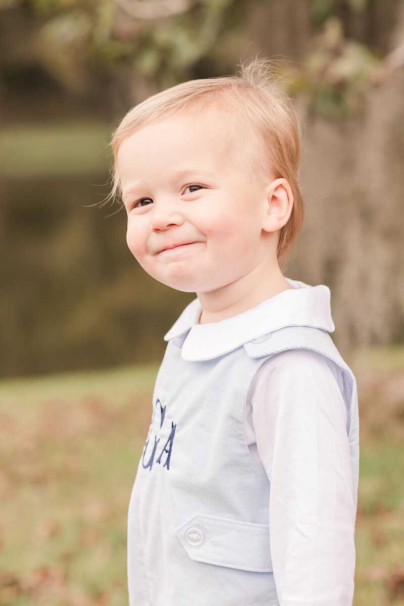 toddler boys with side smile