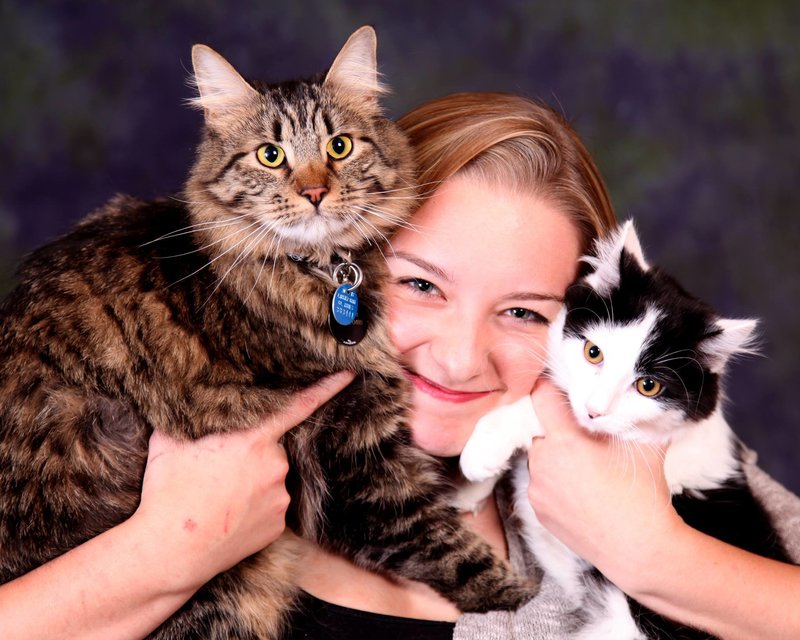 Cassandra and her two cats, Captain and Jack