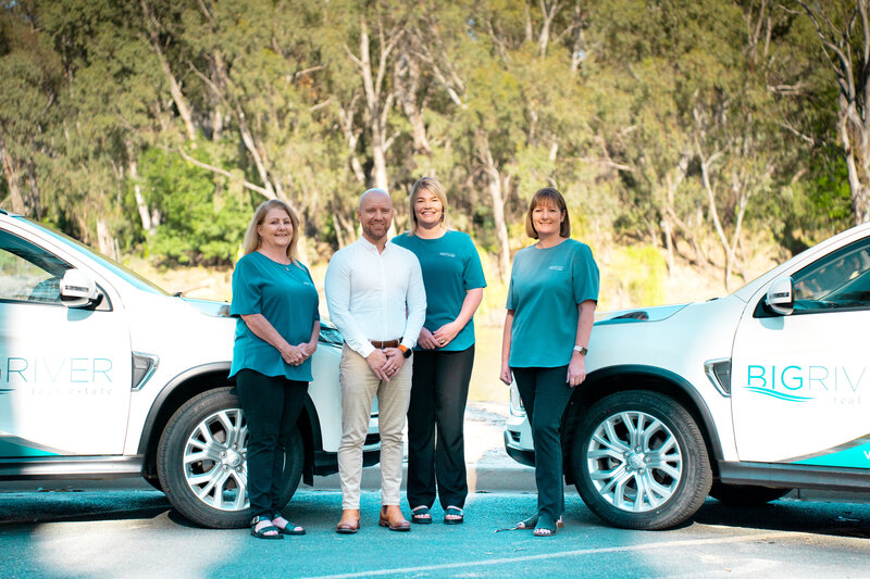 Team photo for Big River Real Estate captured by Highlight Creative.