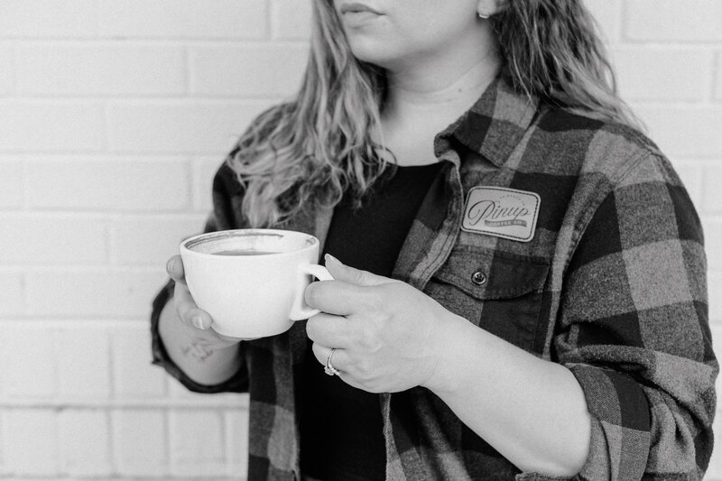 Woman holding coffee mug