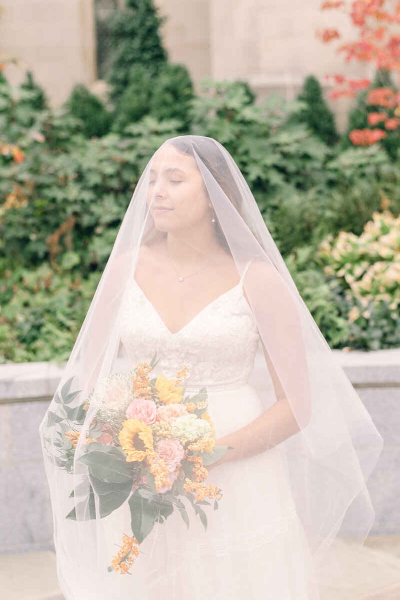 Washington DC fine art bride, bride wearing veil, veil photo inspiration, film bridal  portraits, bridal portraits in DC, Washington National Cathedral