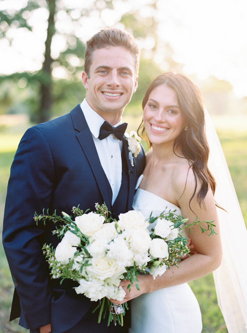 Bride and groom walk up memorial steps at their DC wedding